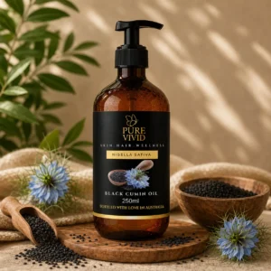 Organic Black Cumin Oil bottle on natural background